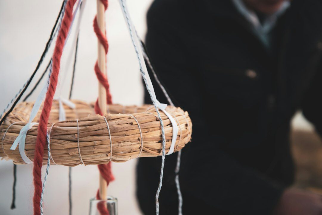 hands weaving basket