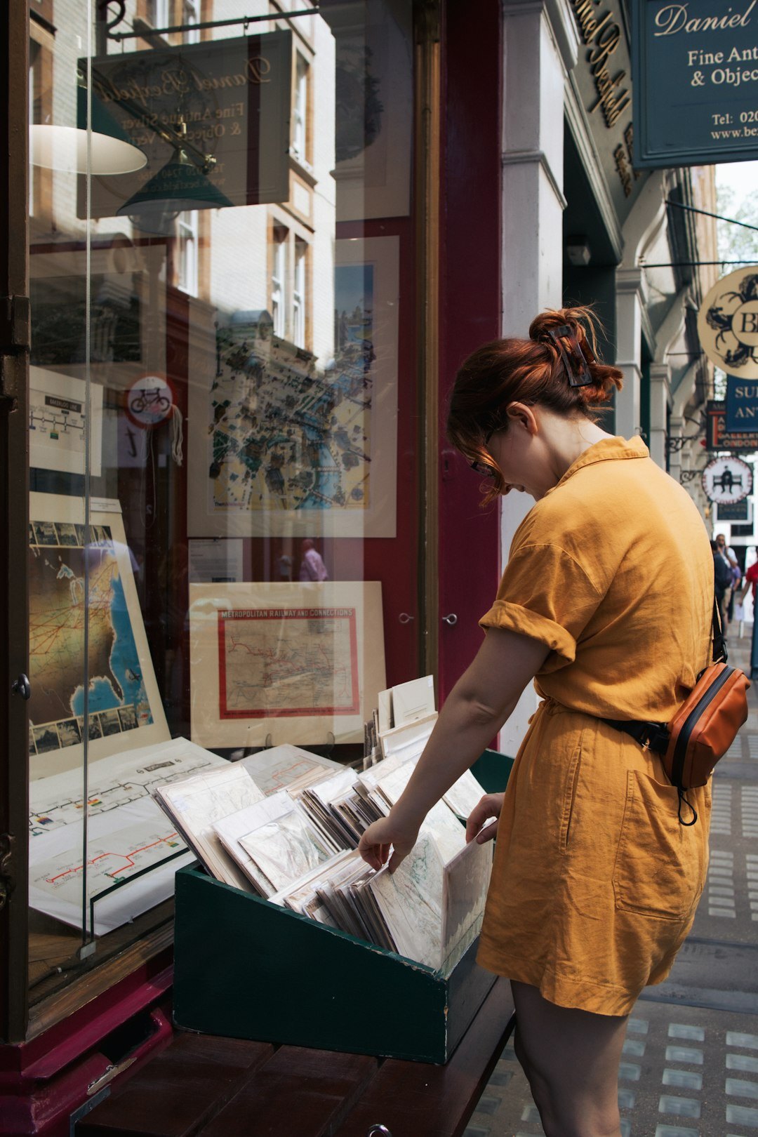 woman examining old documents