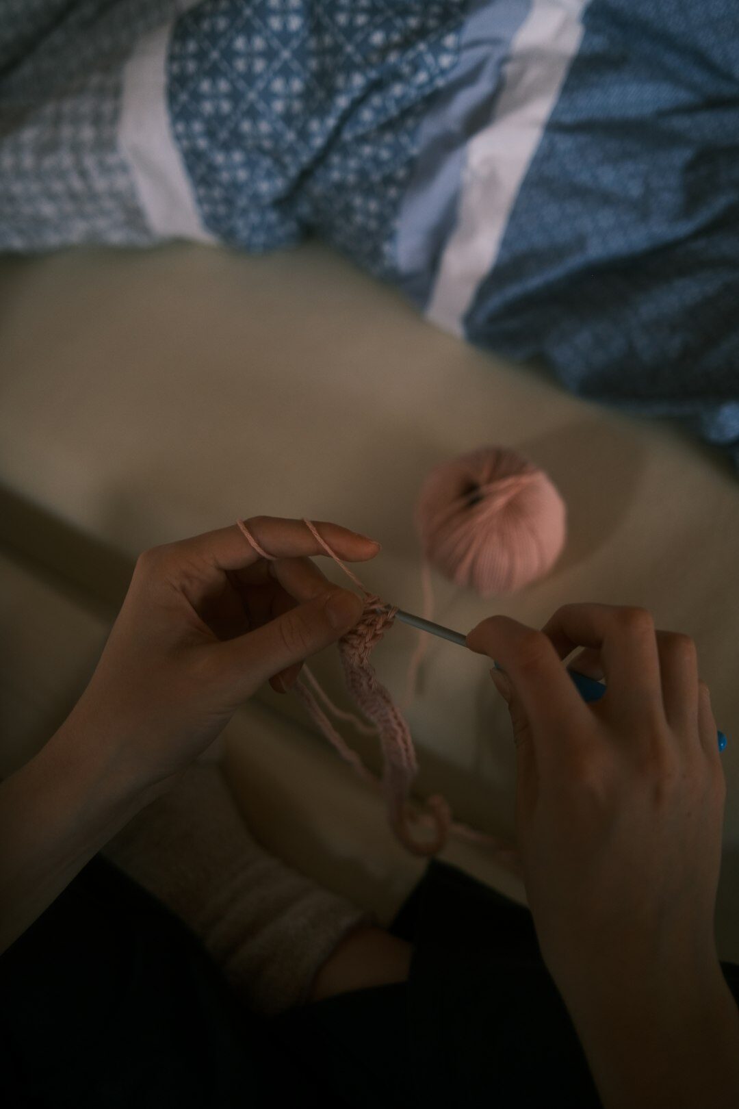 hands knitting with yarn